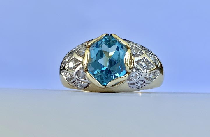 18ct Gold Blue Topaz and Diamond ring valued $2990